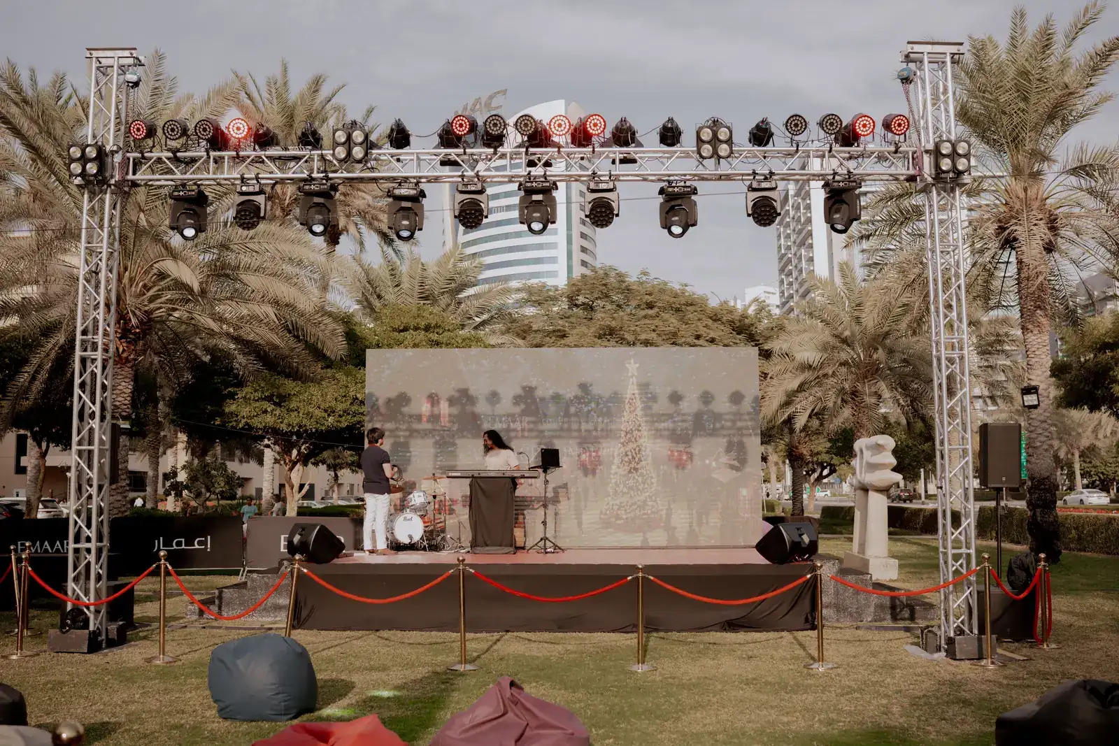 Outdoor stage with truss lighting at a community concert